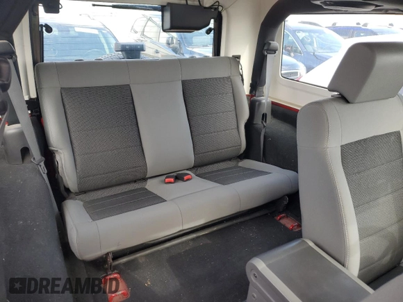 2009 Jeep Wrangler X with VIN 1J4FA24169L727333, listed as a Copart auction lot 47861445 with 70,343 mi miles and Salvage Title. Bid and sale history available at DreamBid. Image 11.