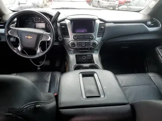 2015 Chevrolet Tahoe LT z VIN 1GNSCBKC9FR118286, wystawiony jako Copart lot #56168375 z przebiegiem 144 824 mil mil oraz Szkoda całkowita • Salvage title. Historia ofert i sprzedaży dostępna na DreamBid. Obrazek 8.