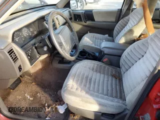 1993 Jeep Grand Cherokee Laredo with VIN 1J4GZ58S7PC674575, listed as a Copart auction lot 79801363 with 996,144 mi miles and Clean Title. Bid and sale history available at carsss.com. Image 7.