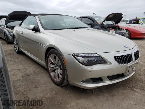 2009 BMW 6 Series 650i with VIN WBAEB53599CX64829, listed as a Copart auction lot 75694824 with 0 mi miles and Salvage Title. Bid and sale history available at carsss.com. Image 4.