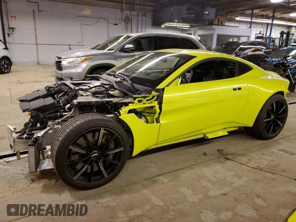 2020 Aston Martin Vantage z VIN SCFSMGAWXLGN03363, wystawiony jako Copart lot #81833084 z przebiegiem Nie podano mil oraz Szkoda całkowita • Salvage title. Historia ofert i sprzedaży dostępna na DreamBid. Obrazek 1.