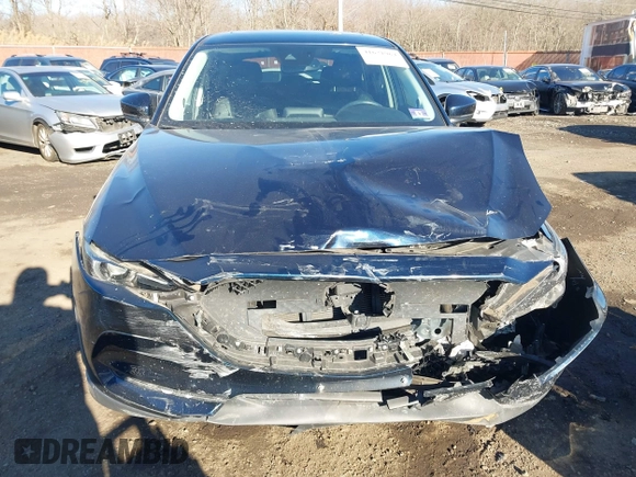 2017 Mazda CX-5 Grand Touring with VIN JM3KFBDL0H0104806, listed as a IAAI auction lot 41621964 with 60,728 mi miles. Bid and sale history available at carsss.com. Image 18.