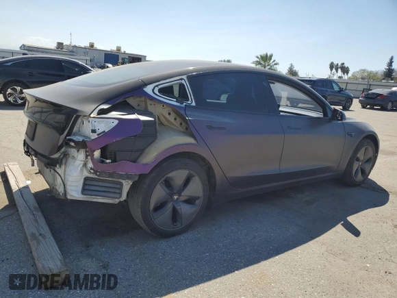 2019 Tesla Model 3 Long Range with VIN 5YJ3E1EB0KF437418, listed as a Copart auction lot 50729915 with 105,148 mi miles and Salvage Title. Bid and sale history available at DreamBid. Image 3.
