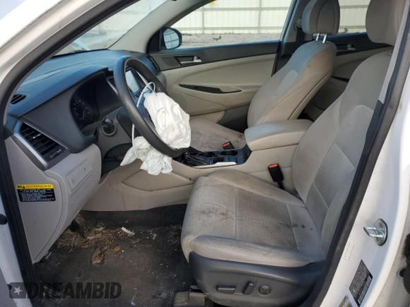 2018 Hyundai Tucson SEL with VIN KM8J3CA44JU738050, listed as a Copart auction lot 87405074 with 131,644 mi miles and Salvage title. Bid and sale history available at DreamBid. Image 7.