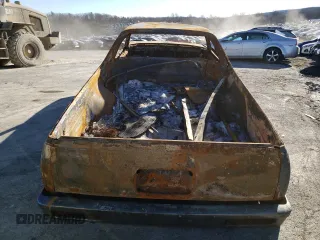 1986 Chevrolet El Camino z VIN 3GCCW80Z0GS917385, wystawiony jako Copart lot #89348085 z przebiegiem Nie podano mil oraz Szkoda całkowita • Salvage title. Historia ofert i sprzedaży dostępna na DreamBid. Obrazek 6.