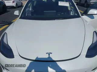 2023 Tesla Model 3 with VIN 5YJ3E1EA0PF548498, listed as a IAAI auction lot 42334326 with 17,674 mi miles and . Bid and sale history available at DreamBid. Image 10.