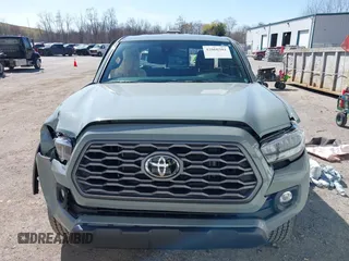 2023 Toyota Tacoma SR z VIN 3TYSZ5ANXPT128361, wystawiony jako IAAI lot #42060301 z przebiegiem 16 608 mil mil oraz . Historia ofert i sprzedaży dostępna na DreamBid. Obrazek 12.