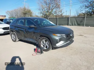 2022 Hyundai Tucson SE with VIN 5NMJA3AE4NH024581, listed as a IAAI auction lot 41725035 with 49,696 mi miles and . Bid and sale history available at carsss.com. Image 1.