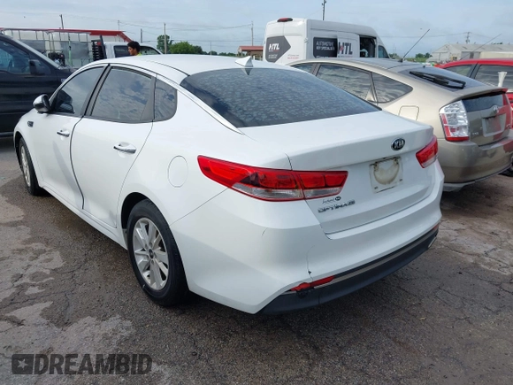 2016 Kia Optima LX with VIN 5XXGT4L31GG041619, listed as a IAAI auction lot 42603879 with 158,755 mi miles and . Bid and sale history available at DreamBid. Image 3.