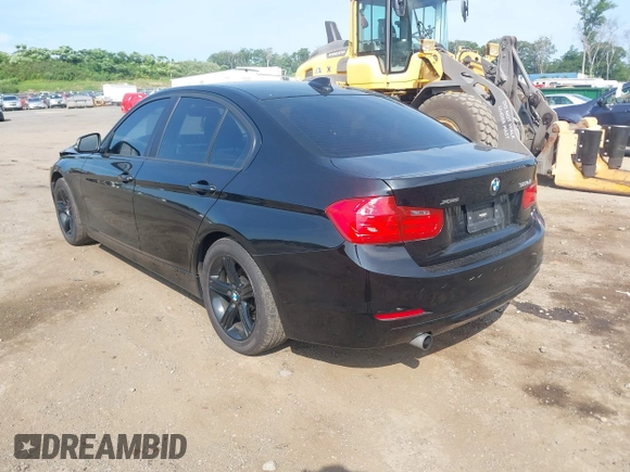 2013 BMW 3 Series 320i xDrive with VIN WBA3C3C50DF981864, listed as a IAAI auction lot 42599429 with 155,150 mi miles and . Bid and sale history available at DreamBid. Image 3.