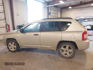 2007 Jeep Compass Sport with VIN 1J8FF47W57D598222, listed as a IAAI auction lot 41379480 with 181,919 mi miles. Bid and sale history available at carsss.com. Image 14.