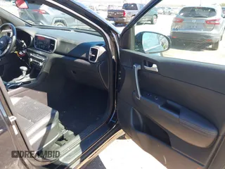 2021 Kia Sportage S with VIN KNDP6CAC6M7887592, listed as a IAAI auction lot 41852917 with 52,185 mi miles and . Bid and sale history available at DreamBid. Image 5.