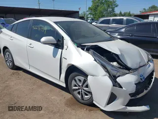 2016 Toyota Prius Four z VIN JTDKARFU3G3004797, wystawiony jako IAAI lot #42276799 z przebiegiem 119 929 mil mil oraz . Historia ofert i sprzedaży dostępna na DreamBid. Obrazek 1.
