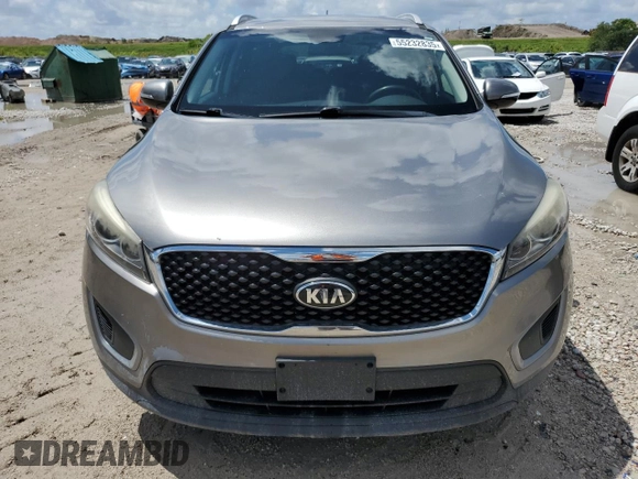 2018 Kia Sorento LX with VIN 5XYPG4A56JG350014, listed as a Copart auction lot 55232835 with 184,875 mi miles and Clean Title. Bid and sale history available at DreamBid. Image 5.