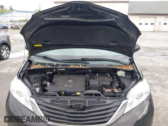 2014 Toyota Sienna LE AAS with VIN 5TDKK3DC0ES487830, listed as a IAAI auction lot 42216342 with 155,973 mi miles and . Bid and sale history available at carsss.com. Image 10.