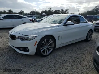 2016 BMW 4 Series 428i with VIN WBA3V7C54G5A27939, listed as a Copart auction lot 80689834 with 66,698 mi miles and Salvage Title. Bid and sale history available at carsss.com. Image 1.
