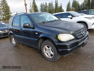 2000 Mercedes-Benz M-Class with VIN 4JGAB54E7YA185568, listed as a IAAI auction lot 41841473 with 1 mi miles. Bid and sale history available at carsss.com. Image 1.