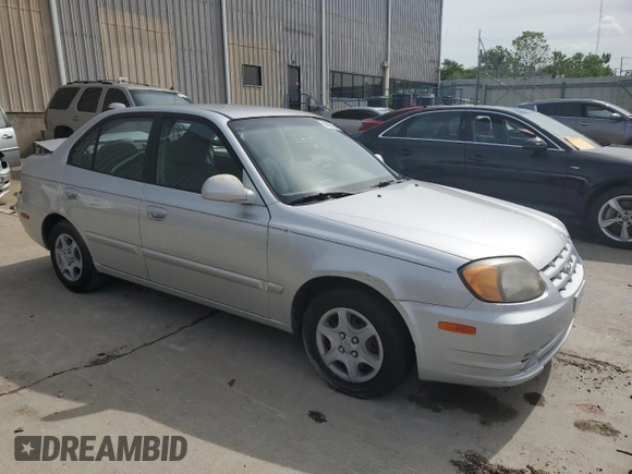 2004 Hyundai Accent GL with VIN KMHCG45C64U524377, listed as a Copart auction lot 53976094 with 65,230 mi miles and Non Repairable. Bid and sale history available at carsss.com. Image 4.