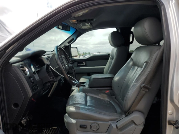 2014 Ford F-150 XL with VIN 1FTFW1EF7EKF37083, listed as a Copart auction lot 55211175 with 205,902 mi miles and Salvage title. Bid and sale history available at DreamBid. Image 7.