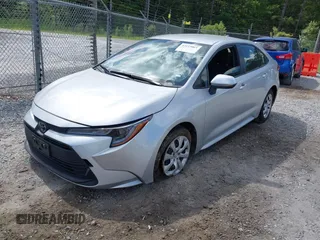 2023 Toyota Corolla LE with VIN JTDB4MEE7P3010297, listed as a IAAI auction lot 42119061 with 51,505 mi miles. Bid and sale history available at carsss.com. Image 2.