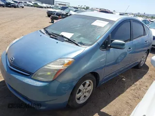 2007 Toyota Prius z VIN JTDKB20U077668819, wystawiony jako IAAI lot #42179765 z przebiegiem 178 388 mil mil oraz . Historia ofert i sprzedaży dostępna na DreamBid. Obrazek 2.