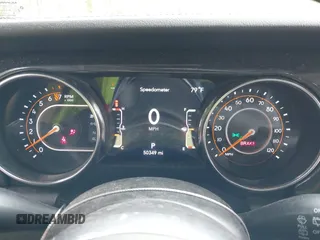 2021 Jeep Wrangler Unlimited Sahara with VIN 1C4HJXEG0MW703812, listed as a IAAI auction lot 42186089 with 50,349 mi miles and . Bid and sale history available at DreamBid. Image 7.