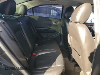 2015 Chevrolet Sonic LTZ z VIN 1G1JE5SB5F4106391, wystawiony jako Copart lot #41699175 z przebiegiem 113 683 mil mil oraz Szkoda całkowita • Salvage title. Historia ofert i sprzedaży dostępna na DreamBid. Obrazek 10.