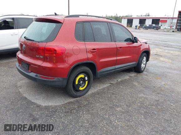 2015 Volkswagen Tiguan R-Line with VIN WVGAV7AXXFW106001, listed as a IAAI auction lot 41652896 with 131,031 mi miles and . Bid and sale history available at DreamBid. Image 4.