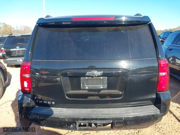 2019 Chevrolet Tahoe LT with VIN 1GNSKBKC2KR365355, listed as a IAAI auction lot 41032993 with 250,419 mi miles. Bid and sale history available at carsss.com. Image 16.