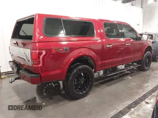 2015 Ford F-150 XLT with VIN 1FTEW1EG5FFB90898, listed as a IAAI auction lot 41617424 with 128,587 mi miles. Bid and sale history available at carsss.com. Image 4.