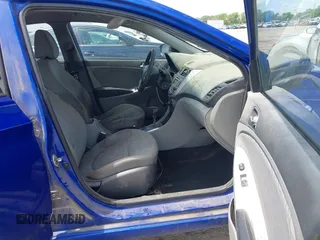 2013 Hyundai Accent GLS with VIN KMHCU4AEXDU437677, listed as a IAAI auction lot 42110350 with 144,947 mi miles. Bid and sale history available at carsss.com. Image 5.