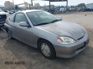 2001 Honda Insight z VIN JHMZE14741T003228, wystawiony jako IAAI lot #41432511 z przebiegiem 227 809 mil mil oraz . Historia ofert i sprzedaży dostępna na DreamBid. Obrazek 1.