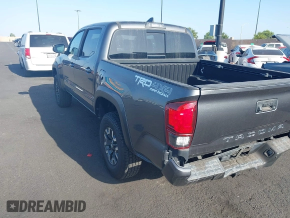 2019 Toyota Tacoma SR with VIN 3TMCZ5AN7KM251625, listed as a IAAI auction lot 42527478 with 45,689 mi miles and . Bid and sale history available at DreamBid. Image 3.