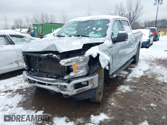 2018 Ford F-150 XL with VIN 1FTFW1E54JKC59793, listed as a IAAI auction lot 41558134 with 217,831 mi miles. Bid and sale history available at carsss.com. Image 20.