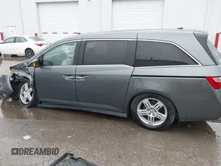2011 Honda Odyssey Touring Elite with VIN 5FNRL5H9XBB090616, listed as a IAAI auction lot 41944510 with 207,962 mi miles and . Bid and sale history available at DreamBid. Image 15.
