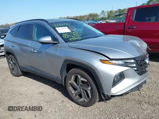 2023 Hyundai Tucson SEL z VIN 5NMJFCAE9PH215739, wystawiony jako IAAI lot #42144761 z przebiegiem 23 272 mil mil oraz . Historia ofert i sprzedaży dostępna na DreamBid. Obrazek 1.