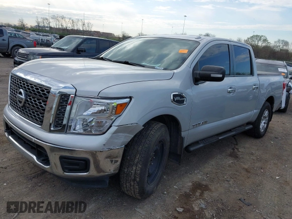 2017 Nissan Titan SV with VIN 1N6AA1EJ3HN538034, listed as a IAAI auction lot 41863785 with 204,198 mi miles and . Bid and sale history available at DreamBid. Image 6.