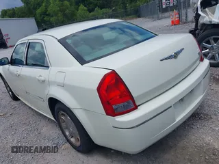 2006 Chrysler 300 Touring with VIN 2C3KA53G96H350490, listed as a IAAI auction lot 41319162 with 209,159 mi miles. Bid and sale history available at carsss.com. Image 3.