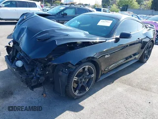 2017 Ford Mustang GT with VIN 1FA6P8CF8H5210452, listed as a IAAI auction lot 42043563 with 77,068 mi miles and . Bid and sale history available at DreamBid. Image 18.