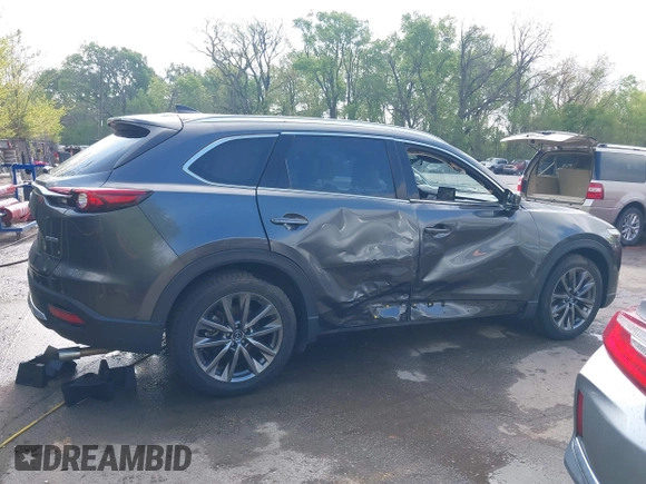 2020 Mazda CX-9 Signature with VIN JM3TCBEYXL0402053, listed as a IAAI auction lot 42070846 with 47,695 mi miles and . Bid and sale history available at DreamBid. Image 14.