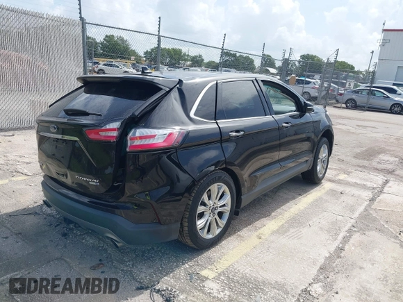 2020 Ford Edge Titanium with VIN 2FMPK4K93LBA05221, listed as a IAAI auction lot 42497787 with Not provided miles and . Bid and sale history available at DreamBid. Image 4.