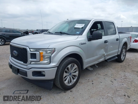 2018 Ford F-150 XL with VIN 1FTEW1CP9JKC79991, listed as a IAAI auction lot 41737265 with 123,655 mi miles and . Bid and sale history available at DreamBid. Image 2.