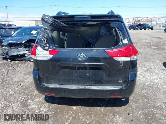 2014 Toyota Sienna LE AAS with VIN 5TDKK3DC4ES445998, listed as a IAAI auction lot 42093872 with 220,943 mi miles. Bid and sale history available at carsss.com. Image 16.