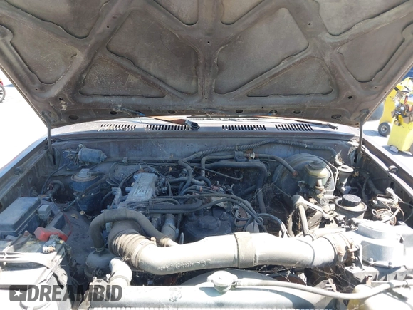 1989 Toyota Pickup DX with VIN JT4RN01PXK7010307, listed as a IAAI auction lot 42212229 with 389,623 mi miles and . Bid and sale history available at DreamBid. Image 10.