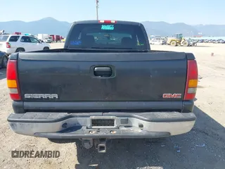 2003 GMC Sierra 1500 SLT z VIN 1GTEK19T03E191705, wystawiony jako IAAI lot #42145392 z przebiegiem Nie podano mil oraz . Historia ofert i sprzedaży dostępna na DreamBid. Obrazek 17.