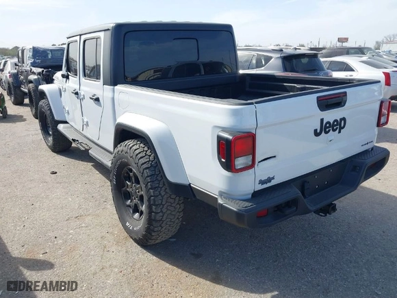 2023 Jeep Gladiator Sport S with VIN 1C6HJTAG9PL547796, listed as a IAAI auction lot 41793602 with 32,721 mi miles. Bid and sale history available at carsss.com. Image 3.