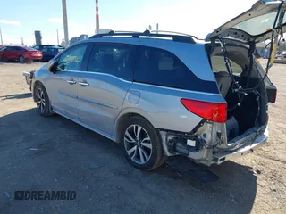 2018 Honda Odyssey Elite z VIN 5FNRL6H96JB004853, wystawiony jako IAAI lot #41877946 z przebiegiem 125 580 mil mil oraz . Historia ofert i sprzedaży dostępna na DreamBid. Obrazek 3.