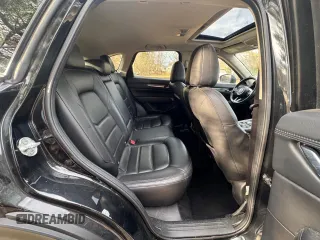 2020 Mazda CX-5 Grand Touring with VIN JM3KFADM8L0785373, listed as a Copart auction lot 50829175 with 135,736 mi miles and Clean Title. Bid and sale history available at DreamBid. Image 6.