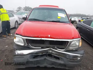 1999 Ford F-150 z VIN 1FTRX17WXXNA90516, wystawiony jako IAAI lot #41787426 z przebiegiem 354 066 mil mil oraz . Historia ofert i sprzedaży dostępna na DreamBid. Obrazek 12.