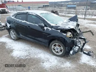 2017 Ford Fiesta SE z VIN 3FADP4BJ2HM138051, wystawiony jako IAAI lot #41608156 z przebiegiem 110 876 mil mil oraz . Historia ofert i sprzedaży dostępna na DreamBid. Obrazek 1.